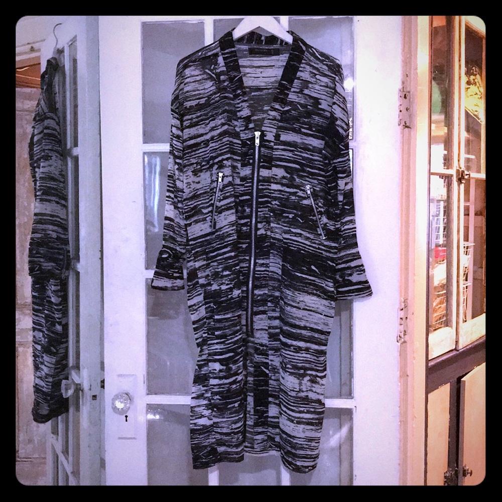 Religion printed tunic with oversized zippers